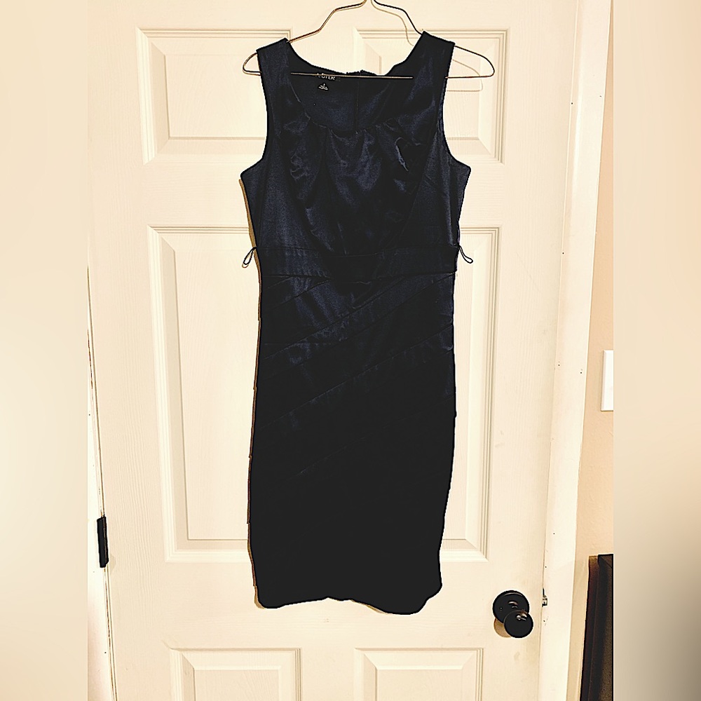 Dark blue dressy dress. Material like that of a bridesmaids dress